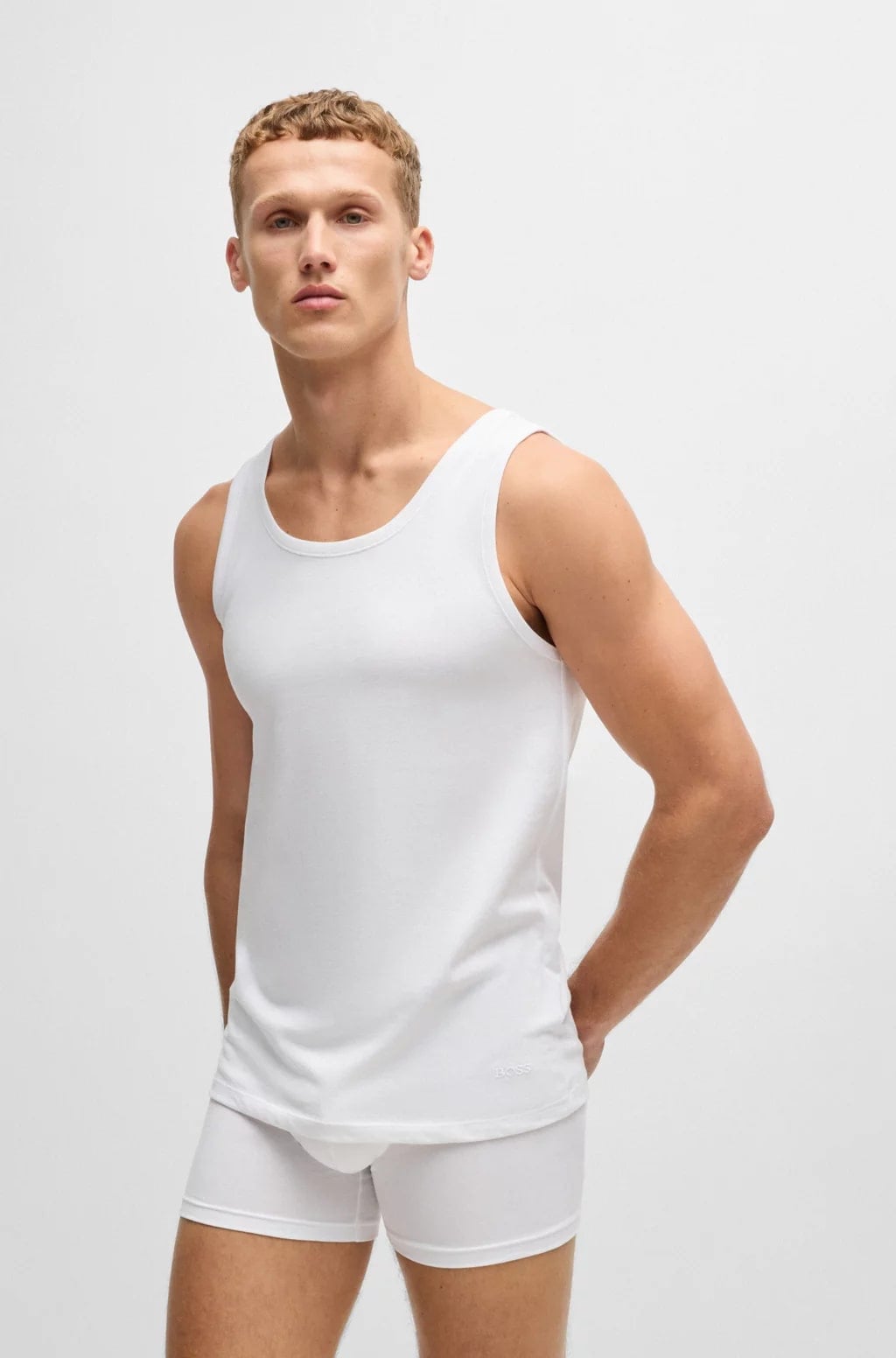 Three-Pack Of Cotton Underwear Vests With Embroidered Logos, view 10